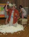 Find the toys in the polystyrene - then it gets tipped over Adrian's head!
