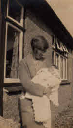 1930 Winifred, the mother, holding Christine