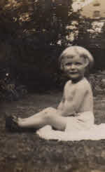 1933 Christine Reason aged 3 sunbathing.