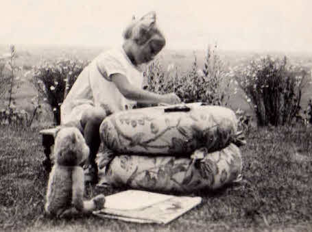 1934 little girl playing in garden