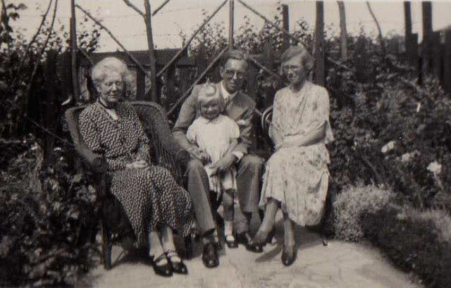 1935 George, Winifred and Christine Whitehead seated in Grandmother Whiteheads garden.