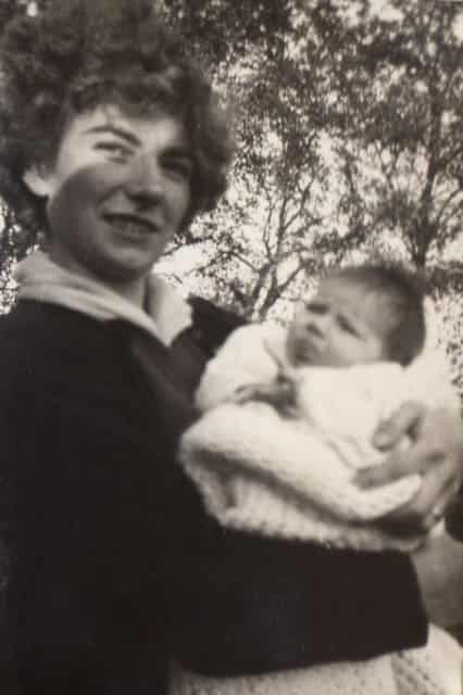 Christine holding baby Peter. [16] 1955 to 1956 baby boy.