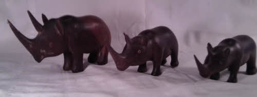 Three Rhinoceros, side by side. Souvenirs from Kenya