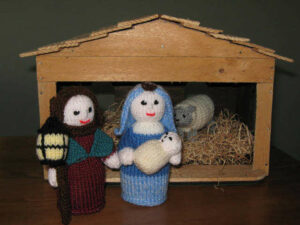 A toy wooden stable with knitted nativity figures. Articles on Jesus Christ from the Bible, non Christian evidence, Bible Truths revealed and personal faith.