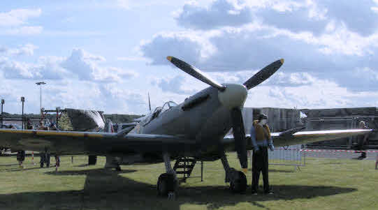 Parked Spitfire on an aerodrome.