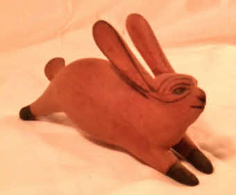 Souvenirs from East Africa, a carved African Hare running.