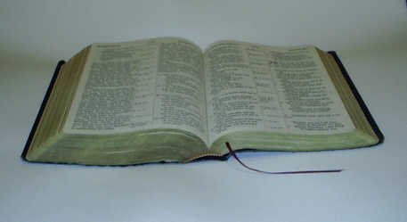 An open Bible. Bible based or Spirit led? Surrendering to the Holy Spirit and the Bible.