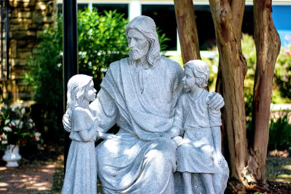 Jesus with two children.