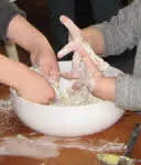 Little fingers in the food mixing bowl! What is Communion, is it the Passover Meal?