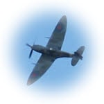 A Spitfire turning away. [15] Earith WW2 and evacuees.